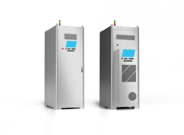 Two tall, silver server cabinets with digital screens.
