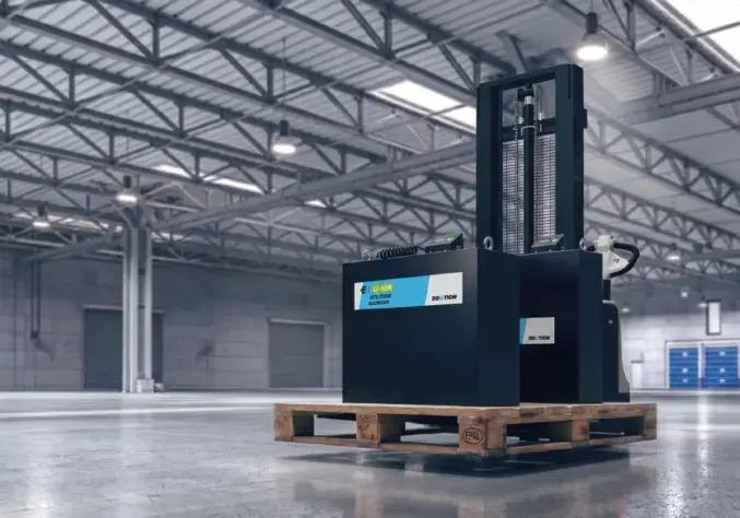 Warehouse with industrial equipment on a pallet.